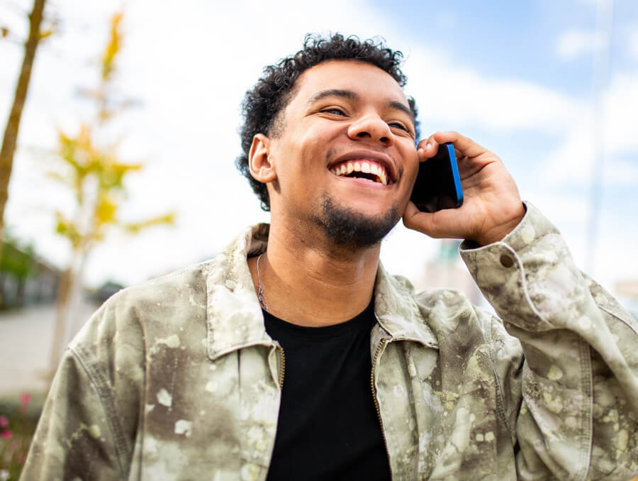 Man smiling on phone