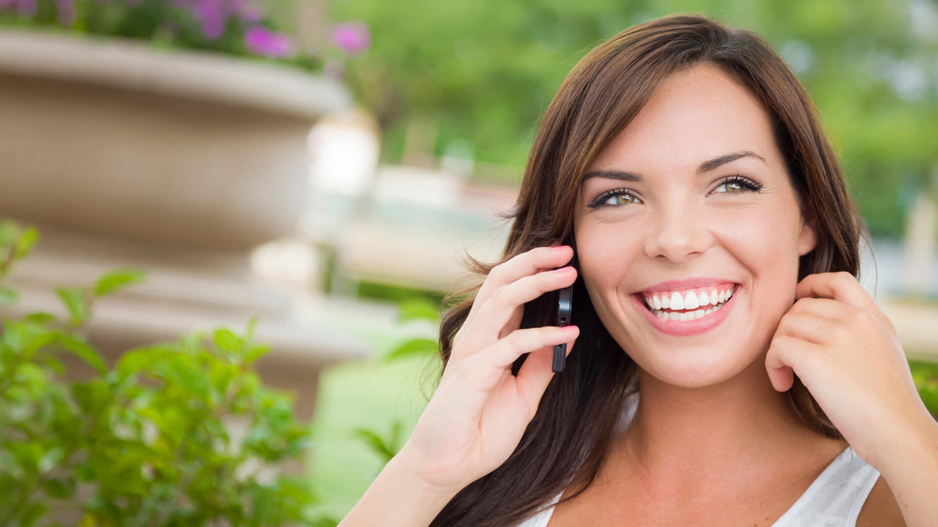Woman on phone smiling